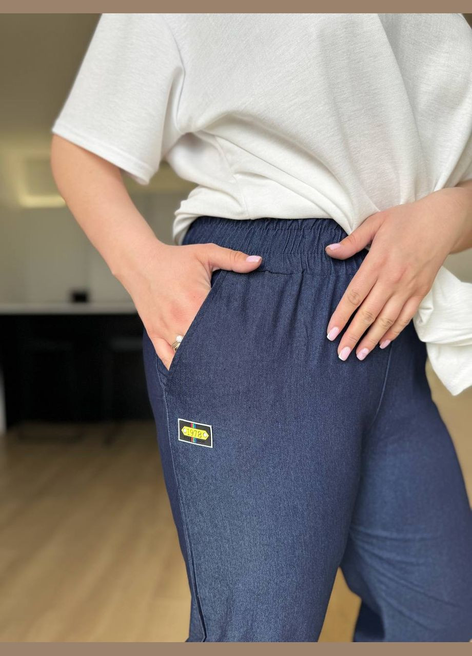 Жіночі штани МОМ колір джинсовий р.58/60 452838 New Trend (285711800)