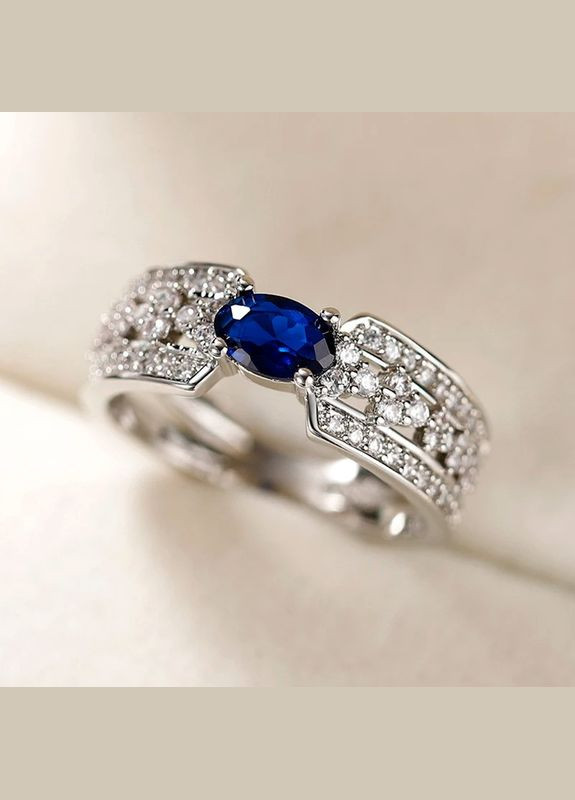 Женское кольцо обручальное кольцо с синим камнем кубиком циркония и множеством белых размер 17 Fashion Jewelry (289355712)