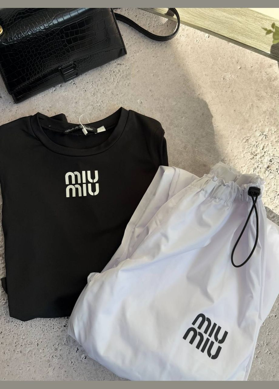 Костюм женский с лонгсливом и брюками. Adelante (321999821)