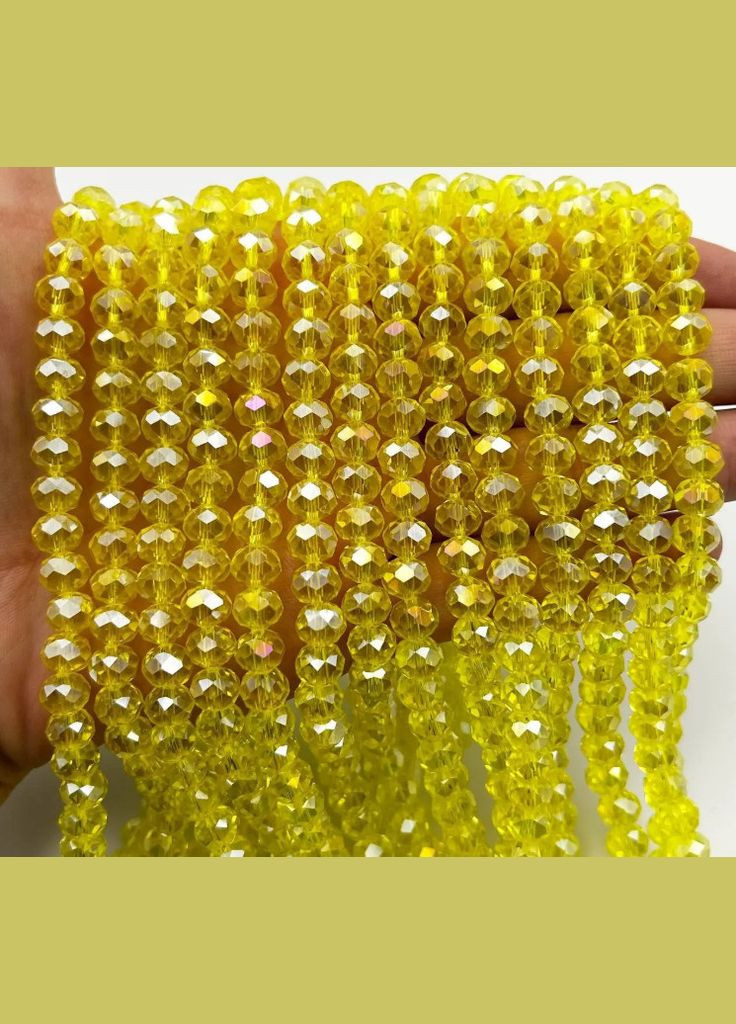 Намистини кришталеві Рондель, 8х6 мм, прозорі АВ, жовті, 70 шт No Brand (340486829)