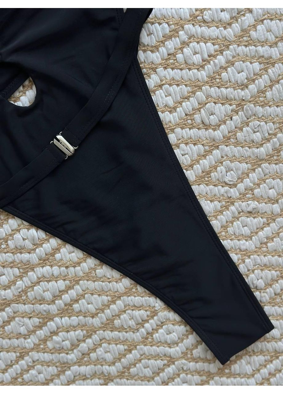 Чорний літній жіночий суцільний купальник з вирізами / жіночий монокіні з декоративними отворами чорний / жіночий купальник No Brand