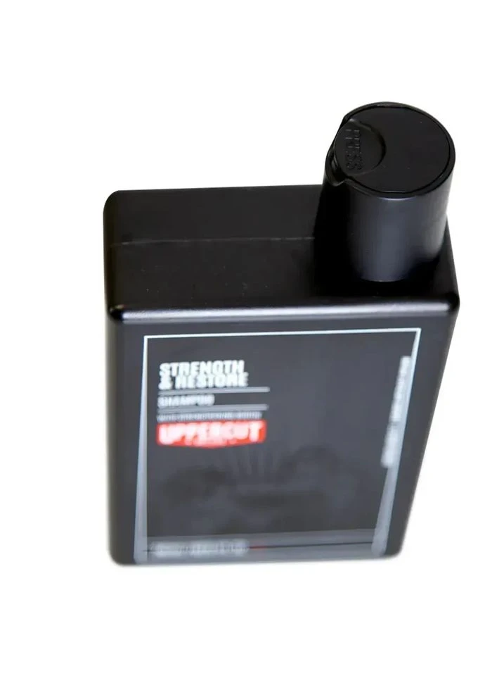 Шампунь Strength and Restore Shampoo чоловічий шампунь для росту сили та блиску волосся з кофеїном і кератином Uppercut Deluxe (388912012)