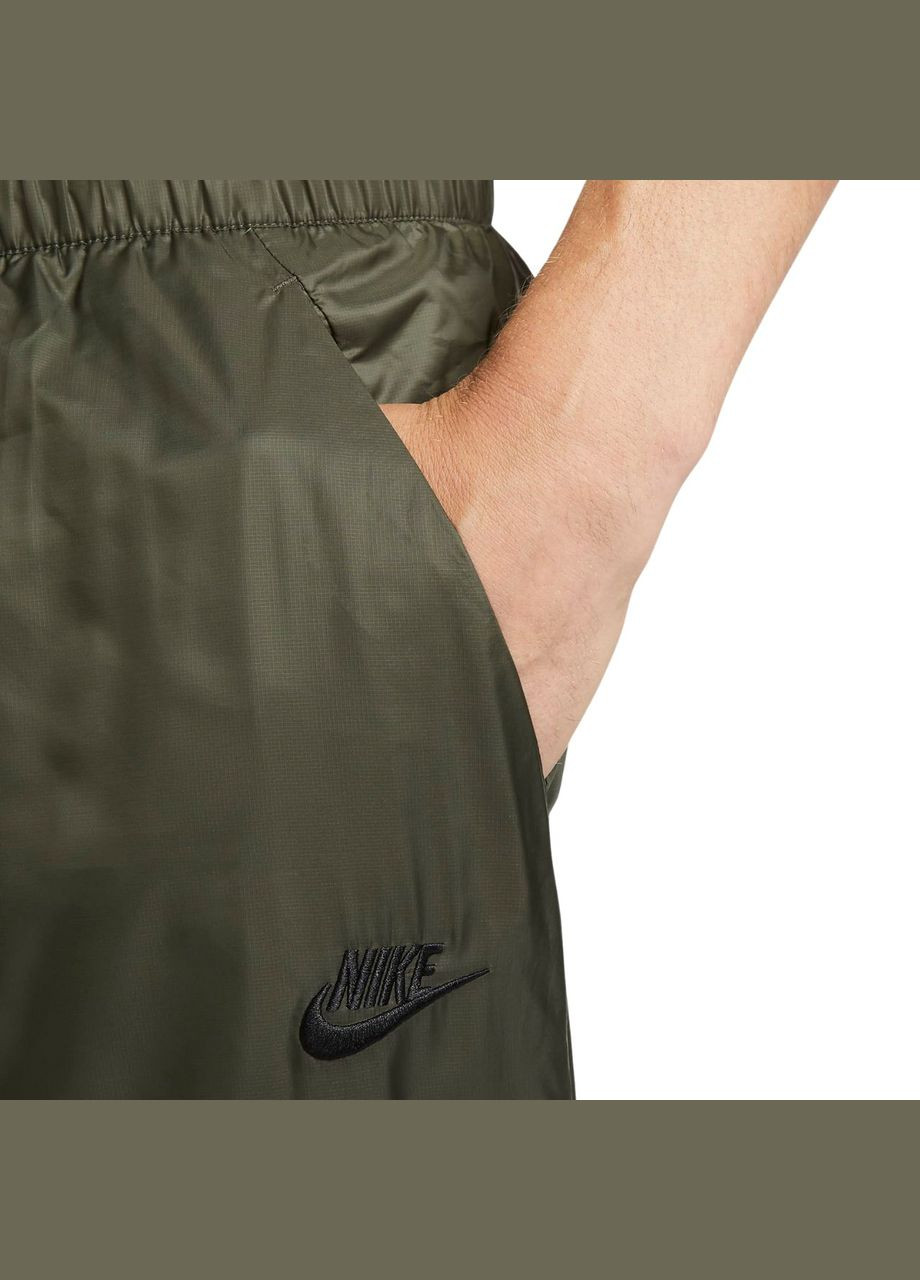 Зеленые демисезонные брюки Nike