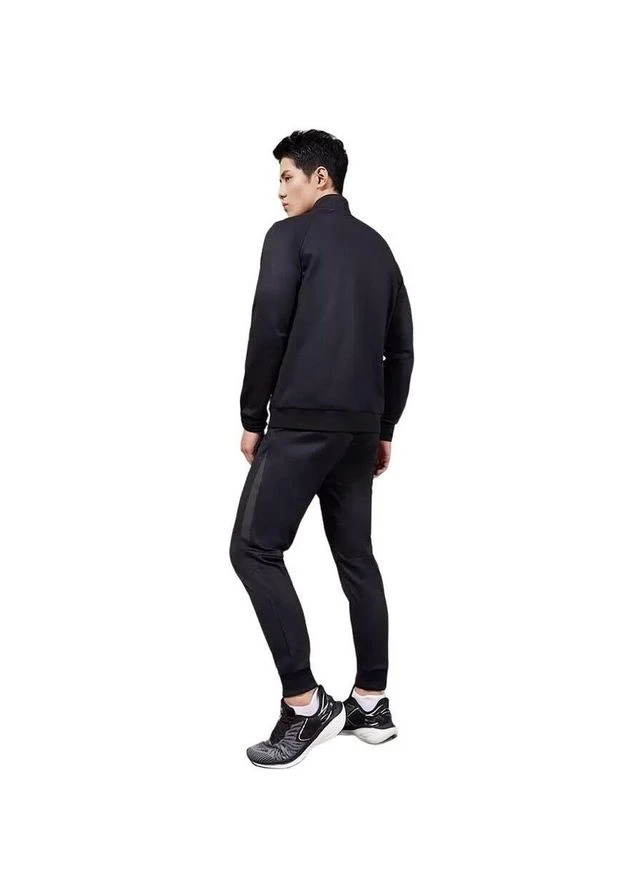 Черные брюки Kelme