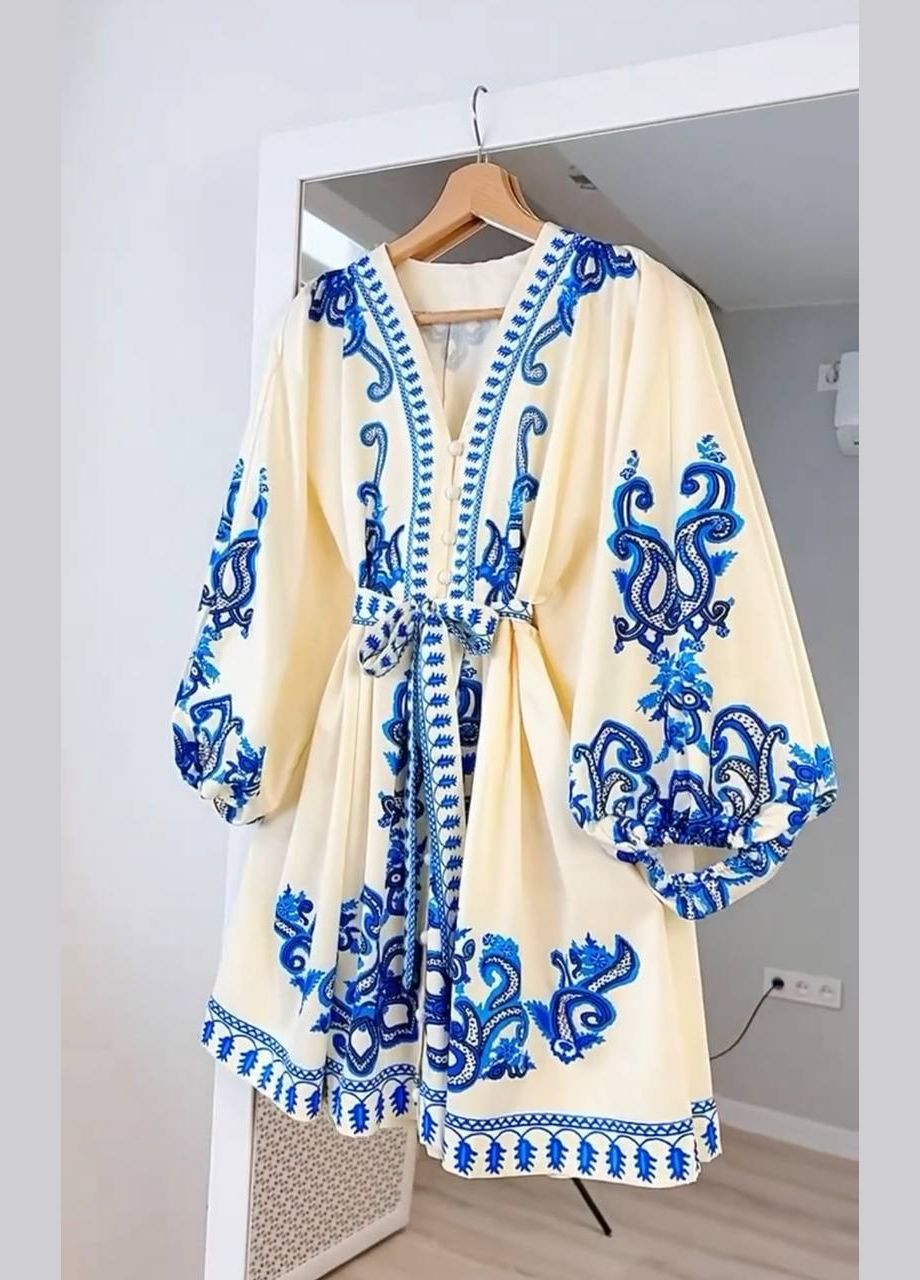 Блакитна повсякденний, коктейльна, вечірня сукня з орнаментом на запах Garna з орнаментом