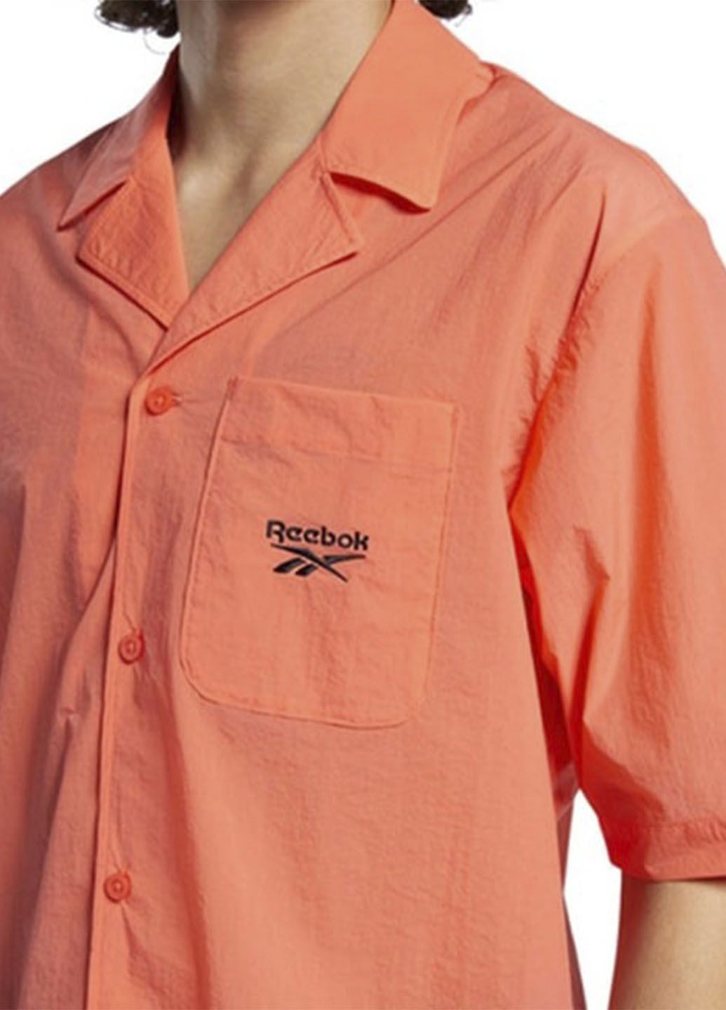 Оранжевая рубашка с логотипом Reebok