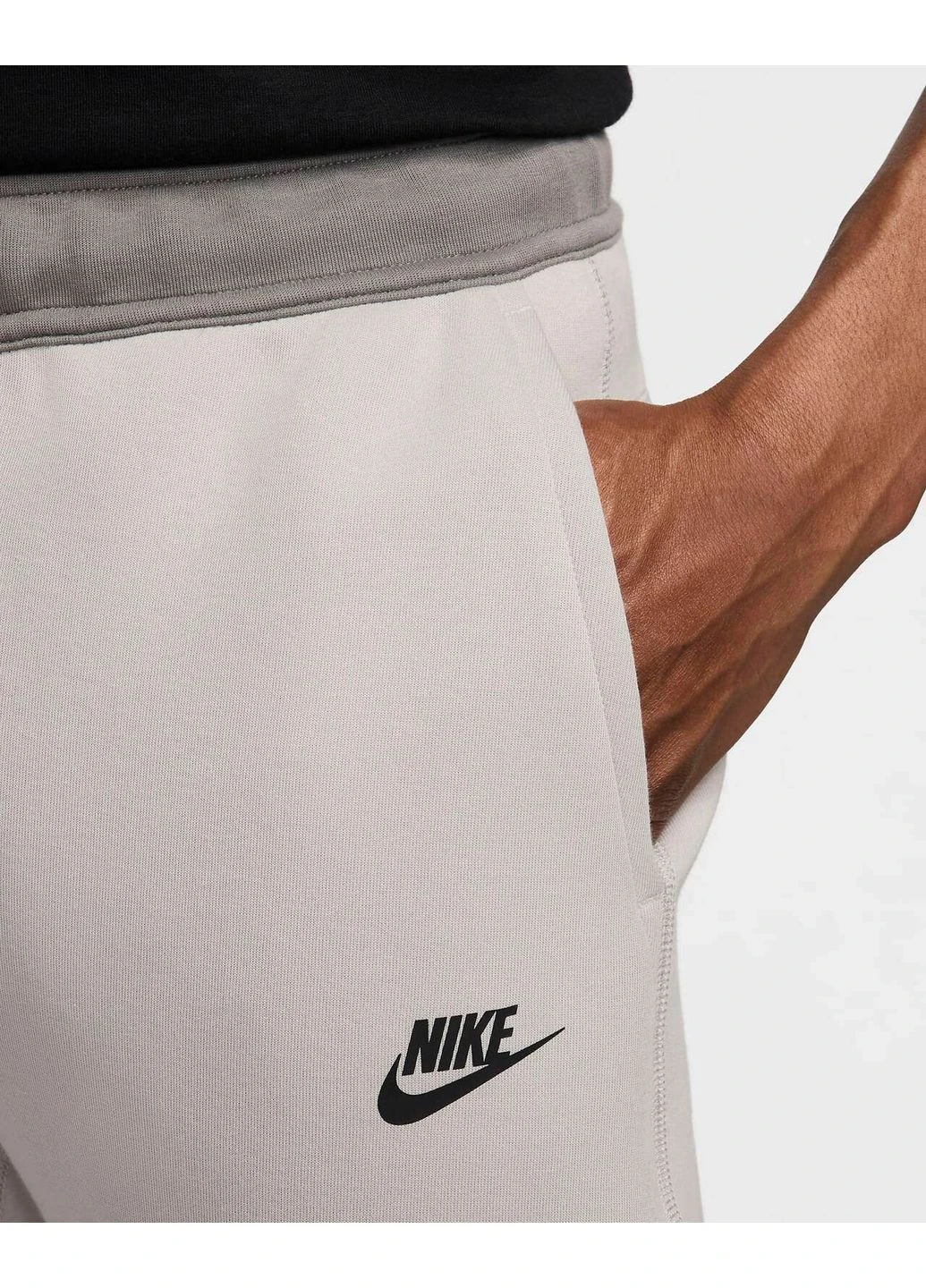 Серые демисезонные брюки Nike