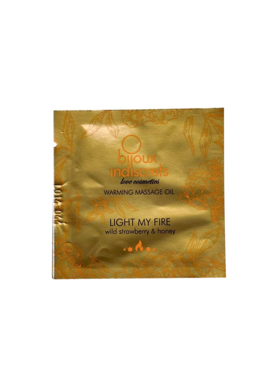 Олія для масажу зігріваюча з ароматом полуниці та меду Light my Fire 2 мл (пробник) Bijoux Indiscrets (331158758)