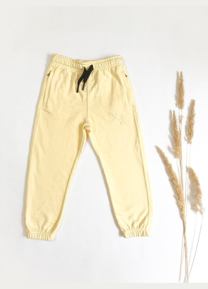 Желтые брюки Zara