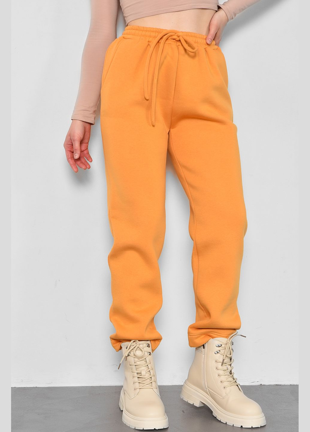 Спортивні штани жіночі на флісі гірчичного кольору Let's Shop (283322908)