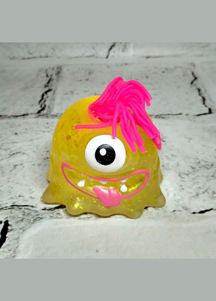 Игрушка антистресс жвачка-тянучка Монстрик 5х6,5 см Желтый No Brand (325428459)