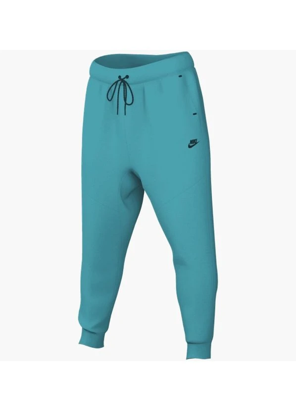 Бирюзовые брюки Nike