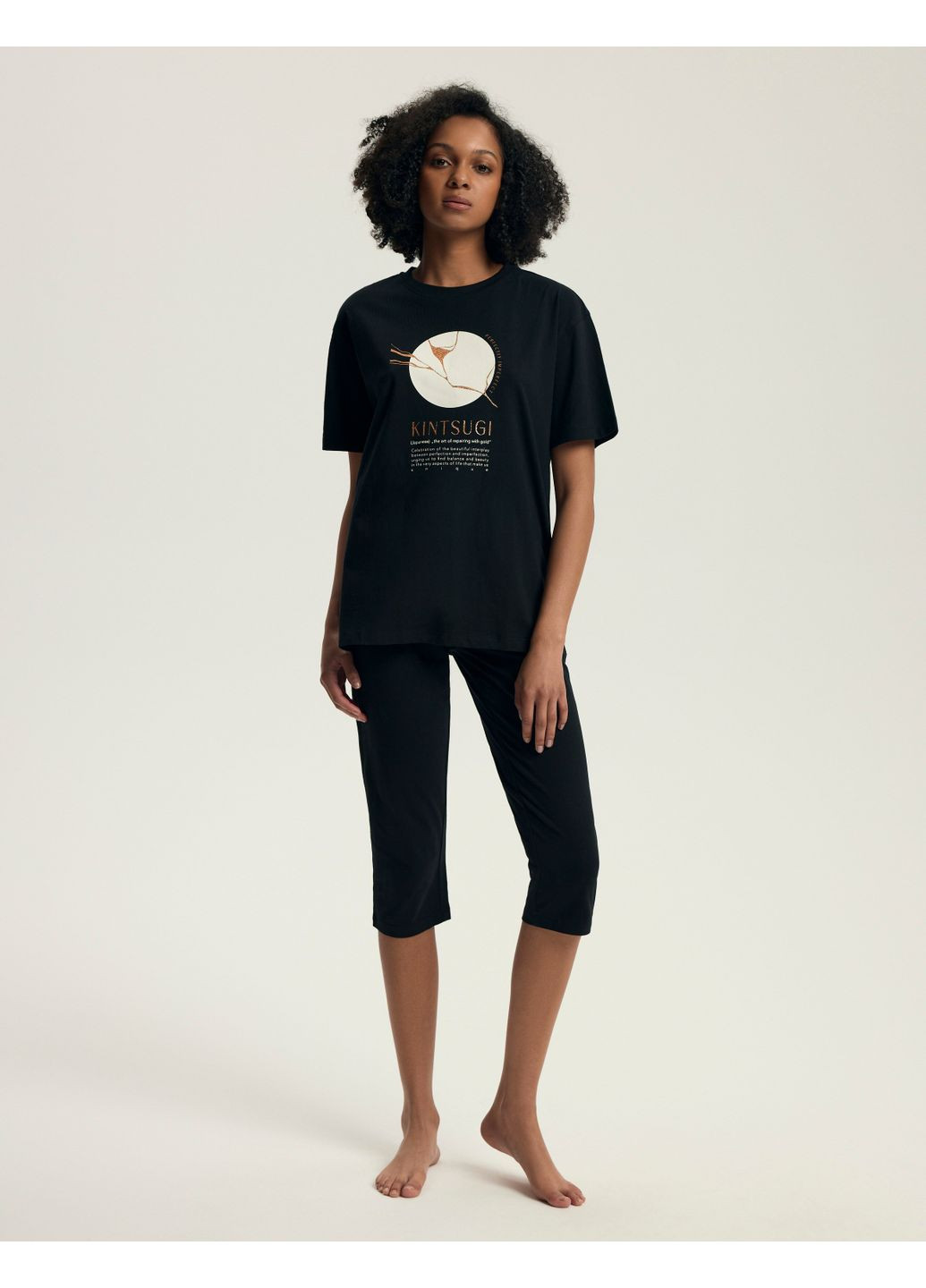 Чорна всесезон жіноча піжама футболка + капрі Henderson