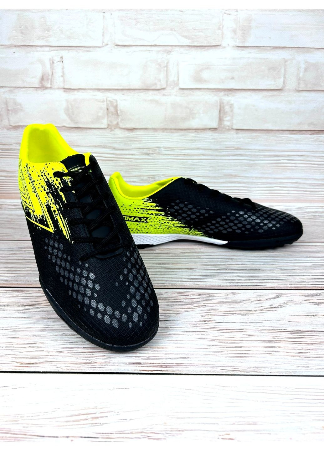 Чоловічі сороконіжки чорні низькі для чоловічів спортивні зі штучної шкіри для футболу No Brand (361970613)