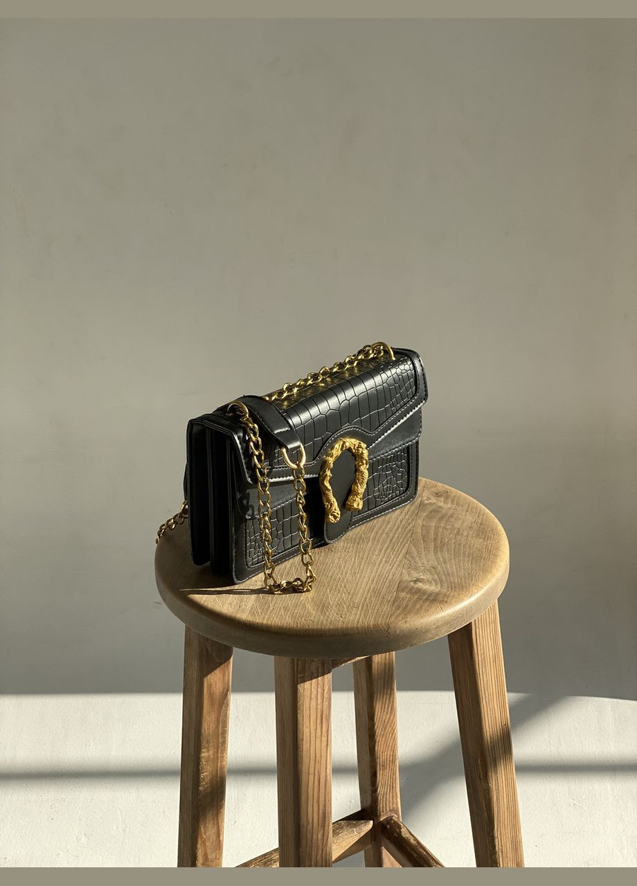 Жіноча сумка на товстому золотому ланцюжку з підковою рептилія крокодил пітон змія чорна No Brand (296008126)