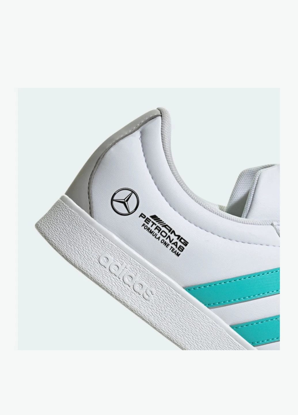 Темно-синій всесезонні кросівки mercedes - amg petronas formula one team vl court base performance jr1069 adidas