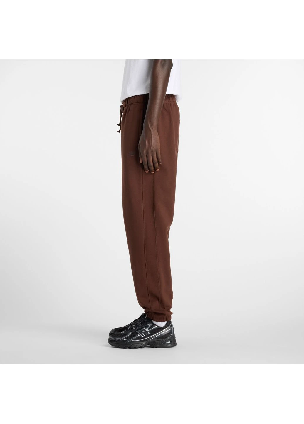 Чоловічі коричневі спортивні брюки Athletics French Terry Jogger 54-56 (XXL) (MP41508ABJ) New Balance MP41508 (392841477)
