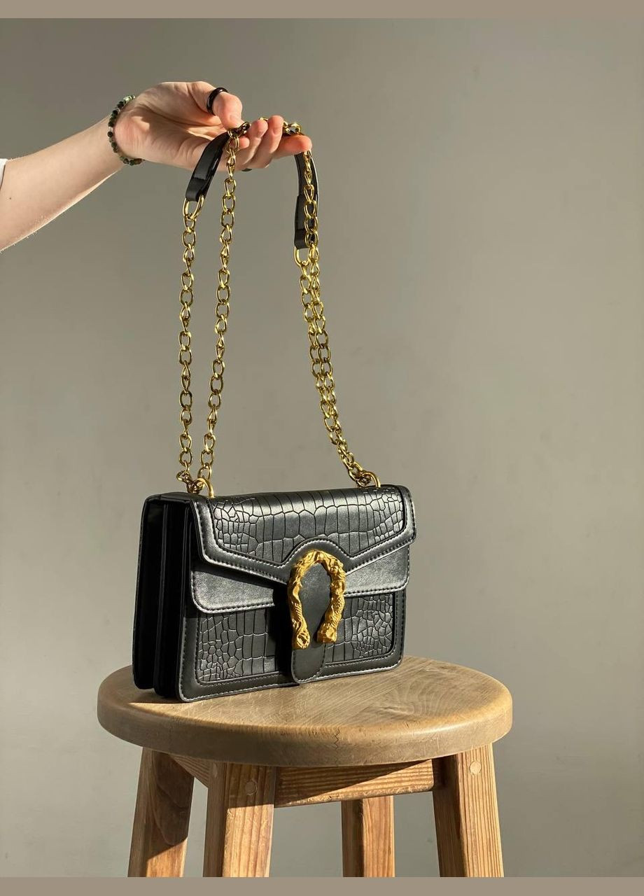 Жіноча сумка на товстому золотому ланцюжку з підковою рептилія крокодил пітон змія чорна No Brand (296008126)