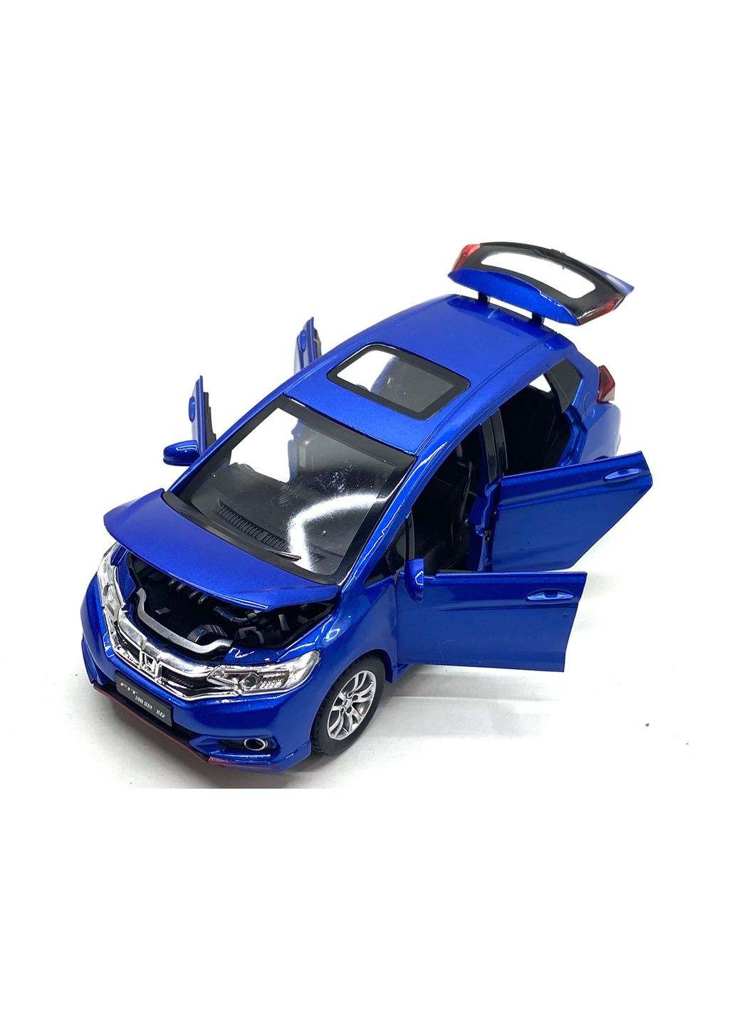 Машинка металлическая TK Union Honda fit 1:32 свет звук открываются двери Синяя (GT-04600) TK Union Group (301421792)
