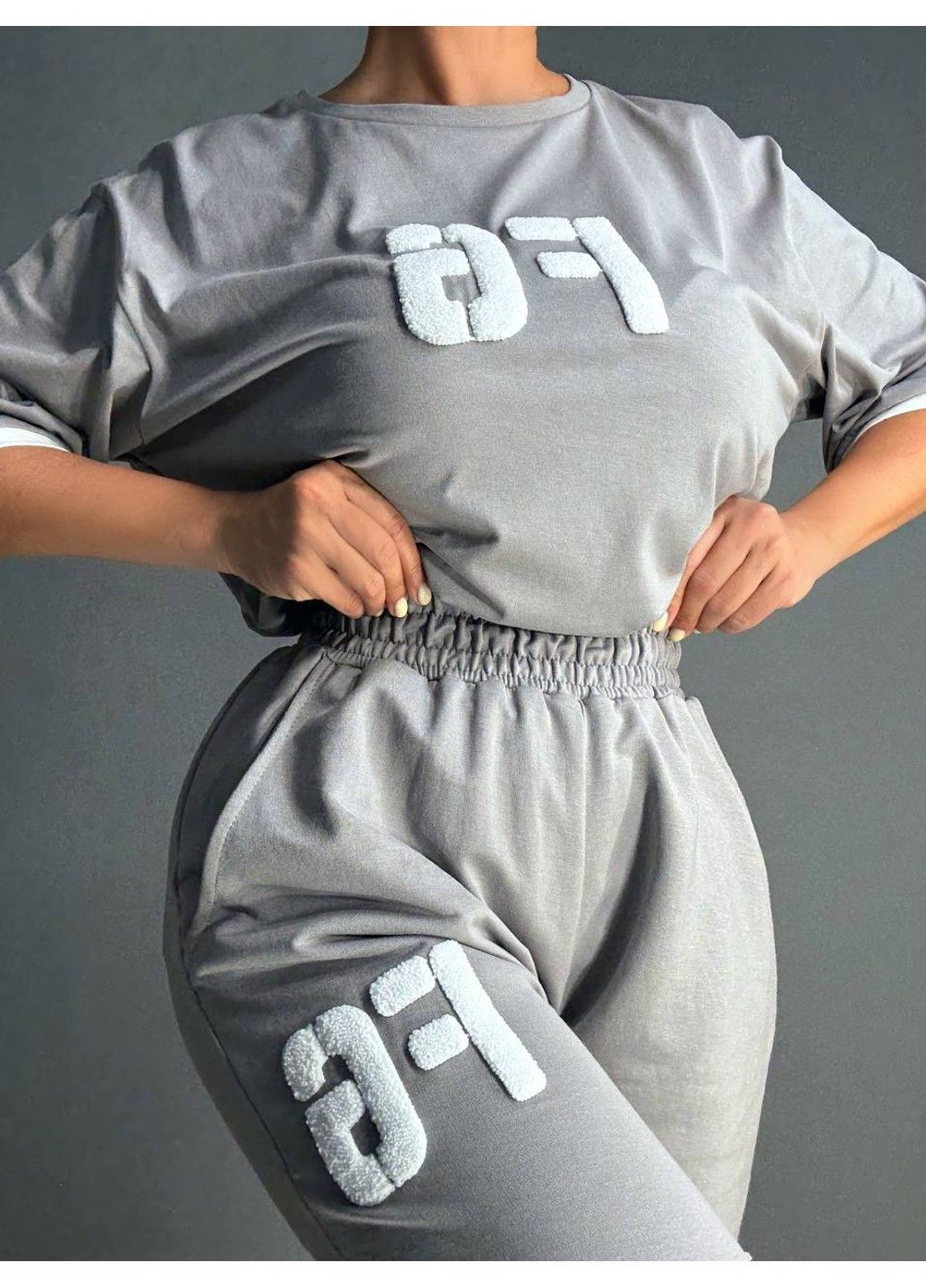 Костюм женский 101190 оверсайз футболка с нашивкой FG и брюки палаццо на резинке серый CAPPITONE (341136142)