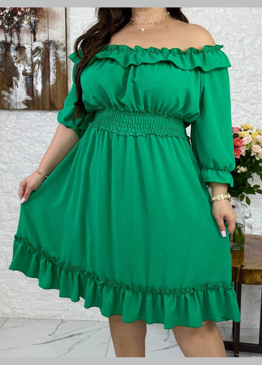 Зеленое платье любопытного кроя Україна однотонное