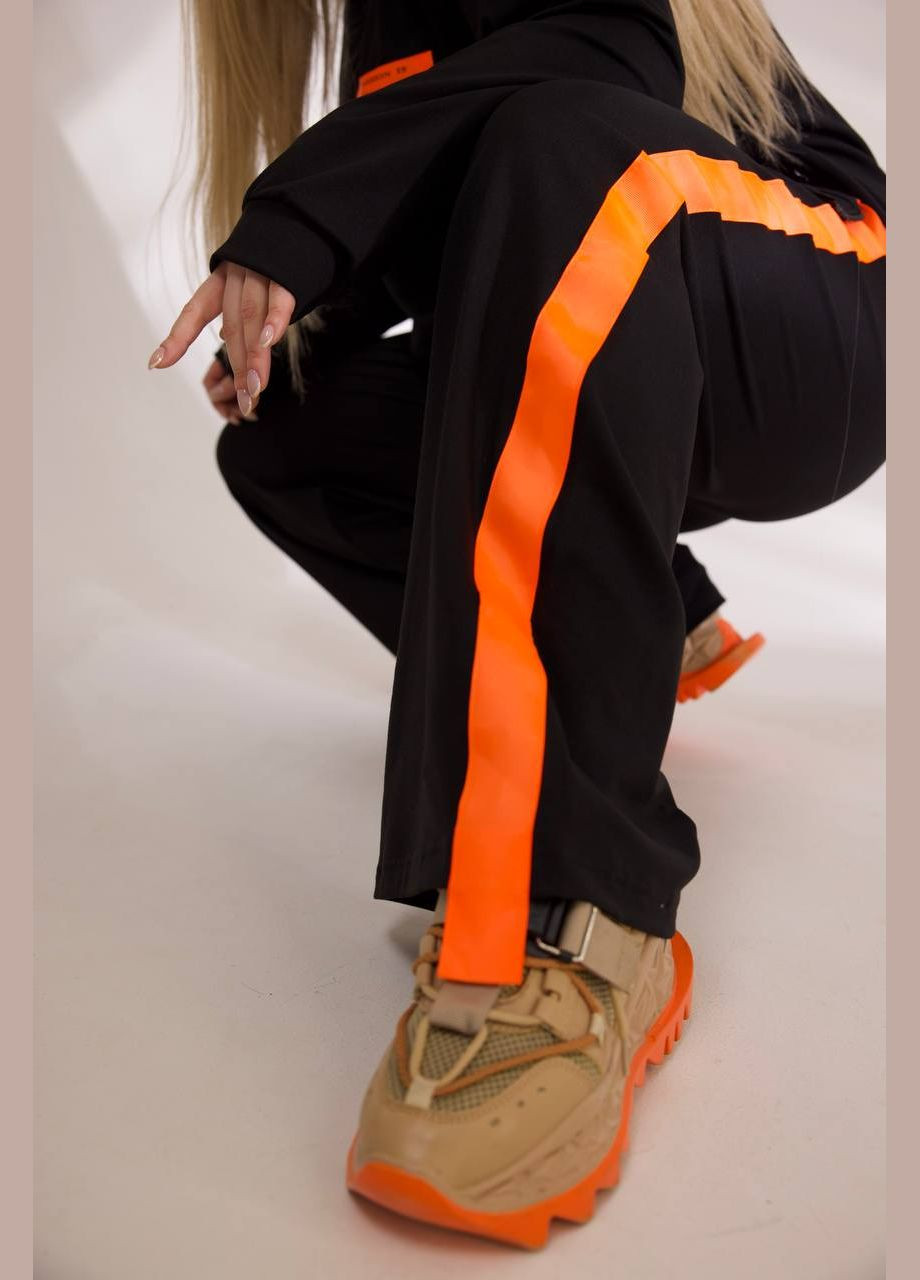 Жіночий спортивний костюм колір чорний з помаранчевим р.50/54 450799 New Trend (282926655)