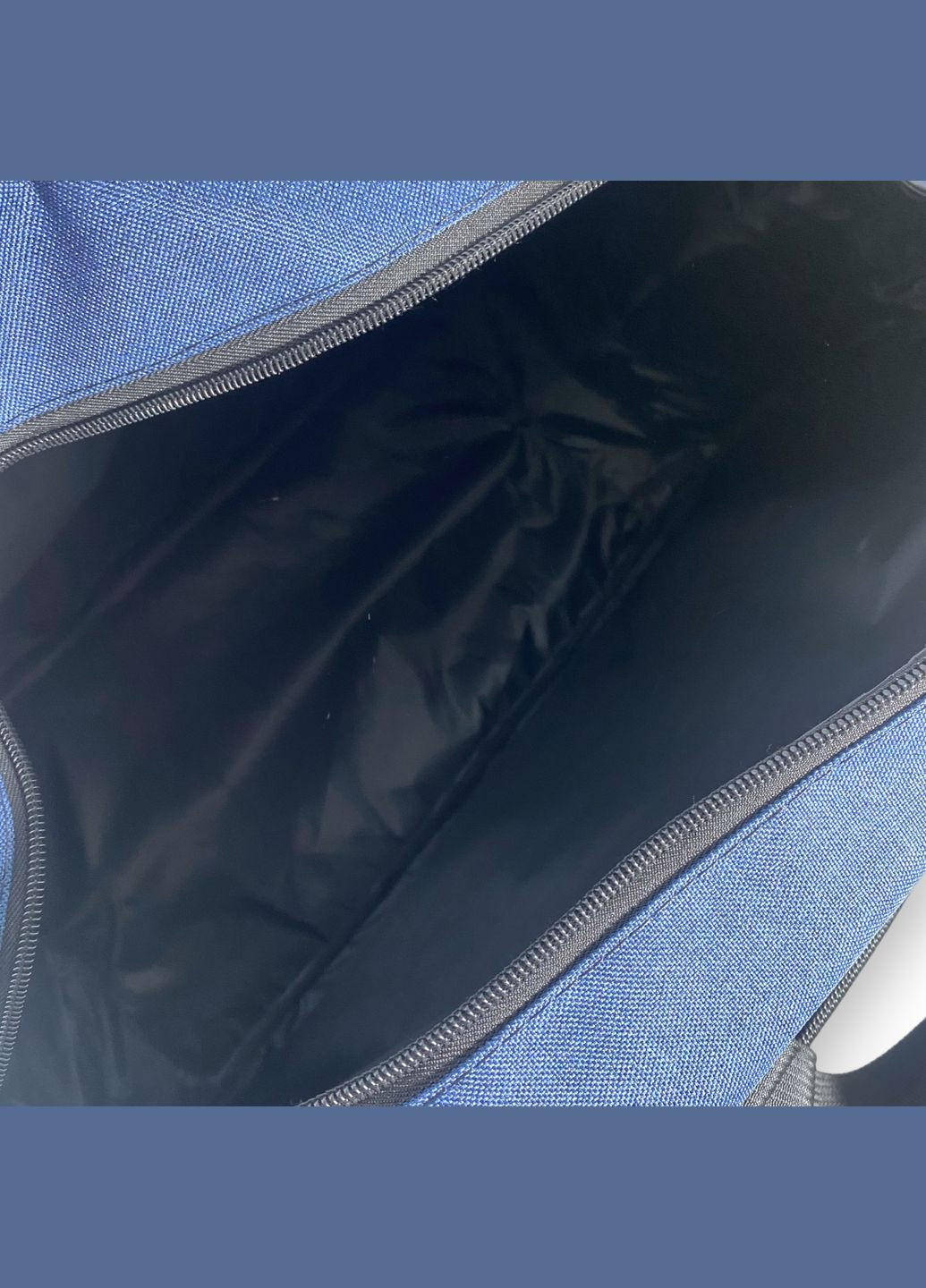 Дорожня сумка, одне відділення, фронтальні кишені, знімний ремінь, ніжки на дні, розмір 56*35*21см синя Favor (284337956)
