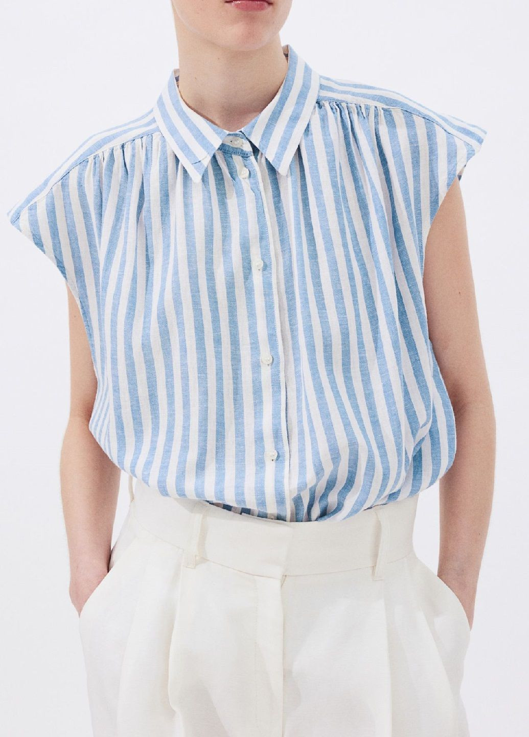 Блакитна літня блузка H&M