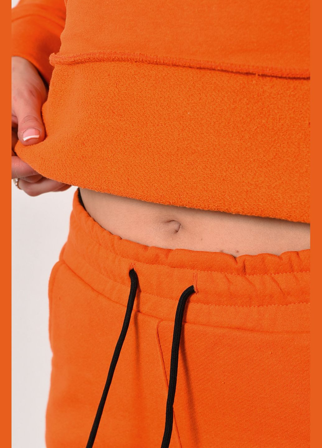 Спортивний костюм жіночий помаранчевого кольору Let's Shop (285692139)