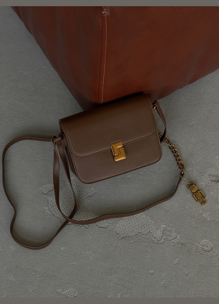 Стильна моделька через плече з двома ремінцями. No Brand (322336252)