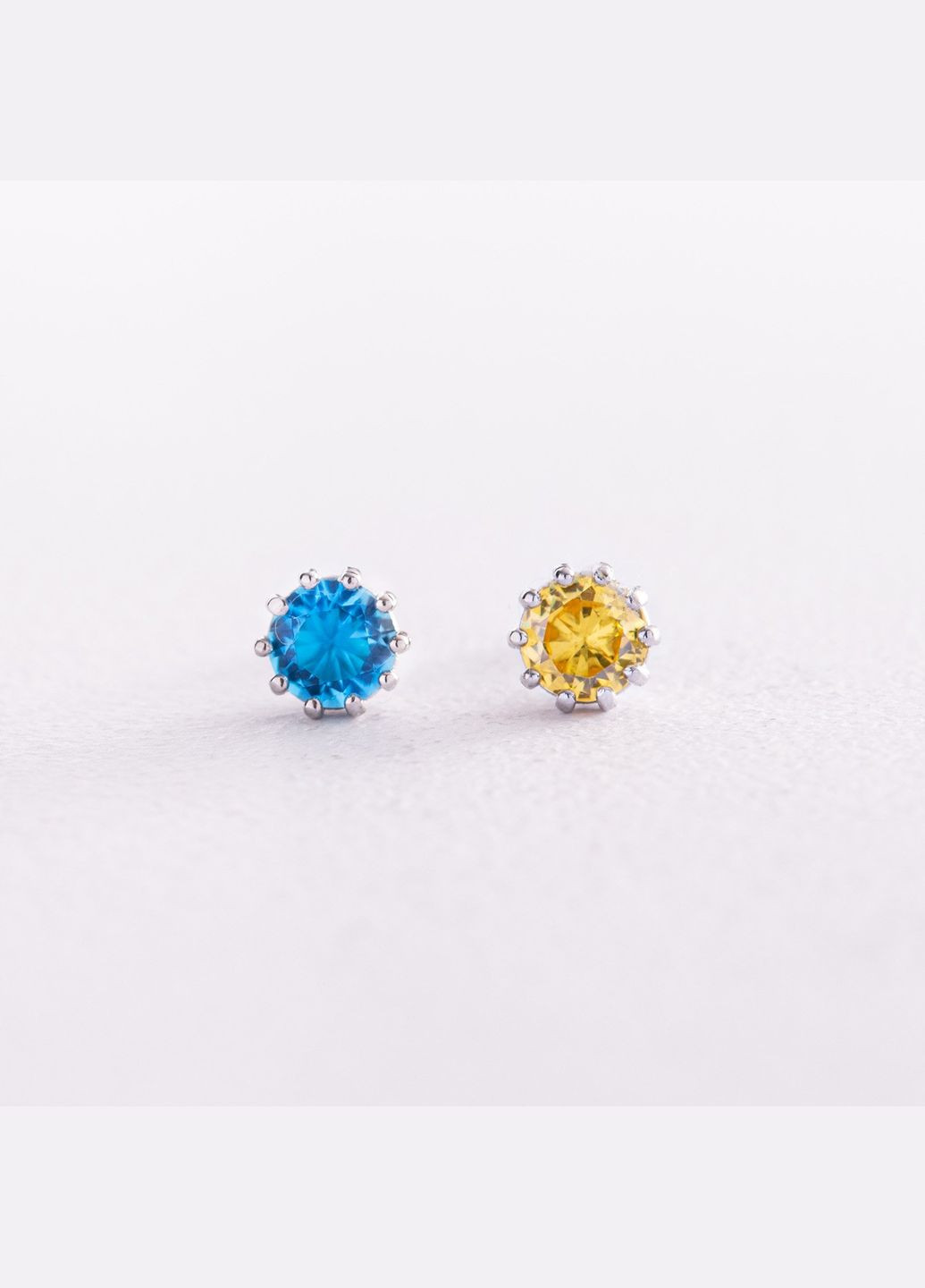 Срібні сережки пусети (блакитне та жовте каміння) 308 Oniks (264295622)