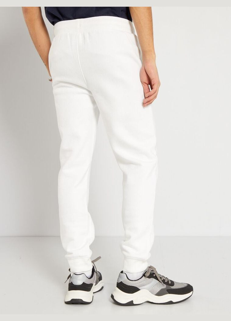 Белые брюки Kiabi