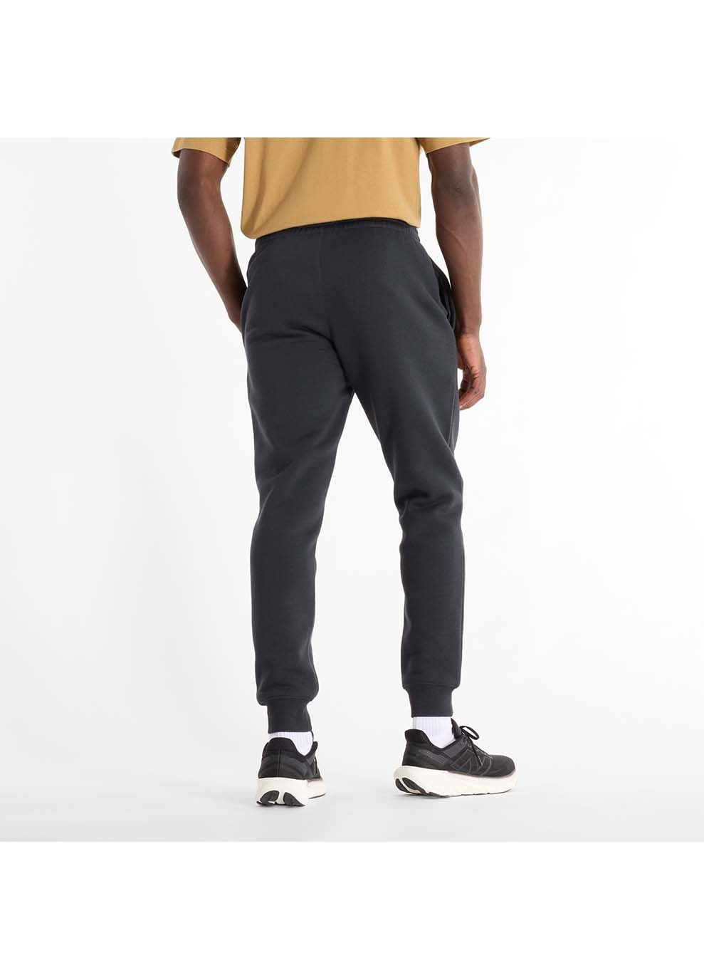 Черные демисезонные брюки New Balance