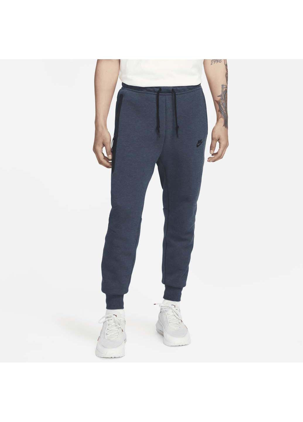 Синие демисезонные брюки Nike