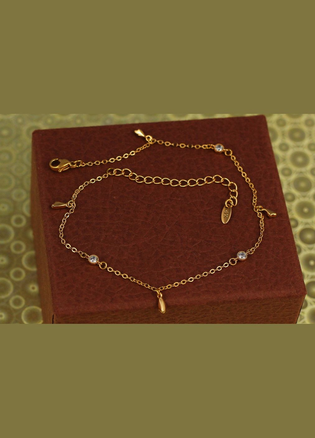 Браслет на ногу с камнями и подвесками лепешка 28 см золотистый. Xuping Jewelry (317269435)