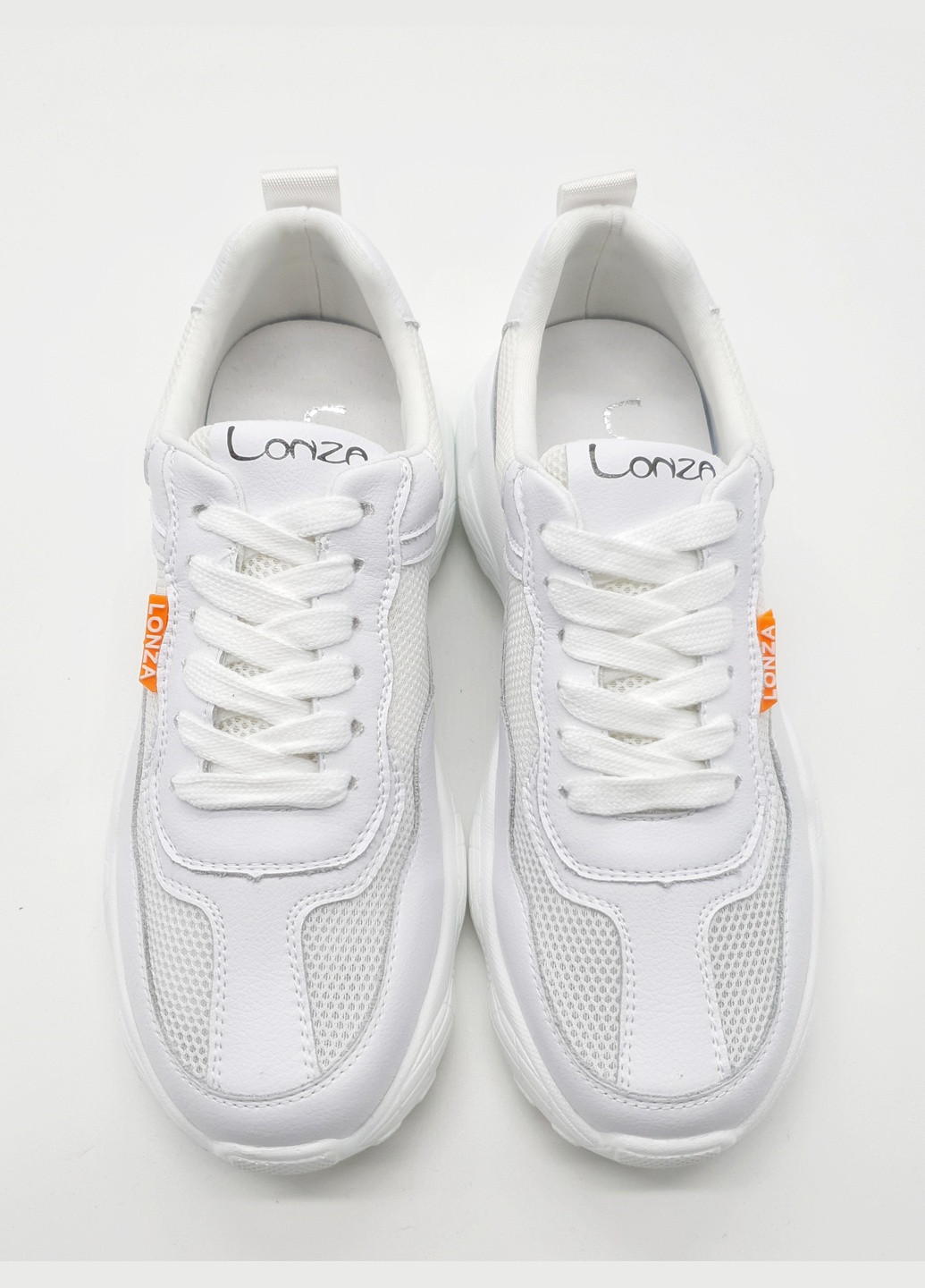 Білі всесезонні жіночі кросівки білі шкіряні l-16-19 245 мм (р) Lonza