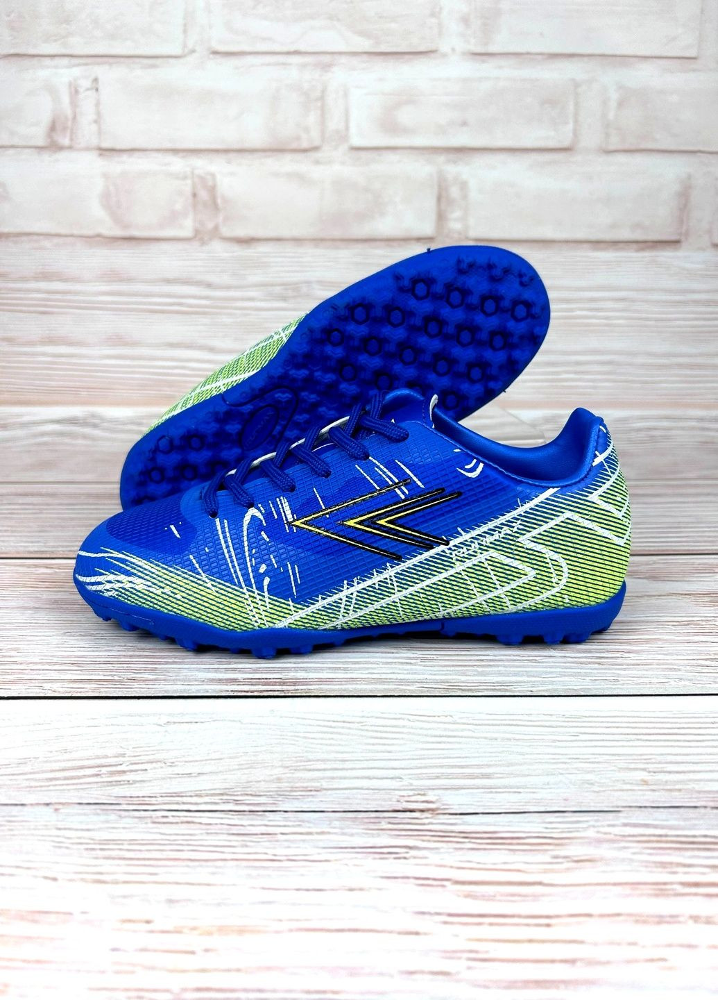 Дитячі сороконіжки сині низькі для дітей спортивні зі штучної шкіри для футболу No Brand (361970588)