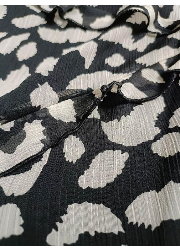 Чорна гарна сукня міді з вирізом на талії. Zara