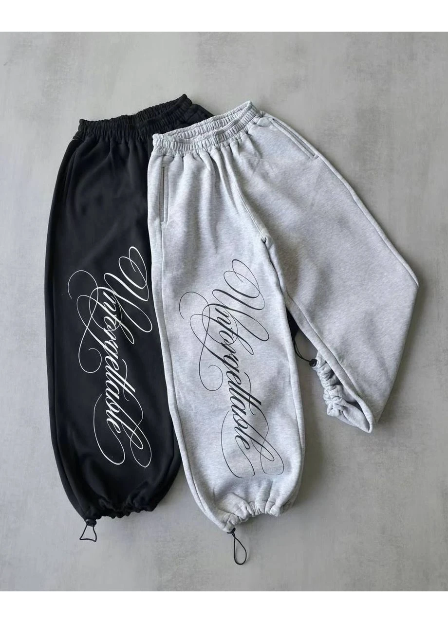 Жіночі спортивні штани oversize з принтом і регульованим низом No Brand (385772522)