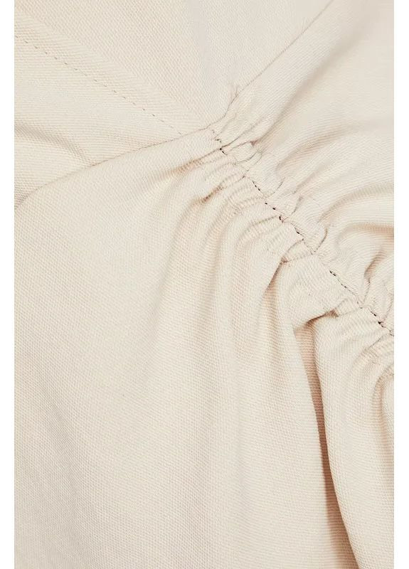 Бежевое праздничный, коктейльное, повседневный, вечернее, кэжуал стильное ассиметричное платье силуэтная, клеш Sandro