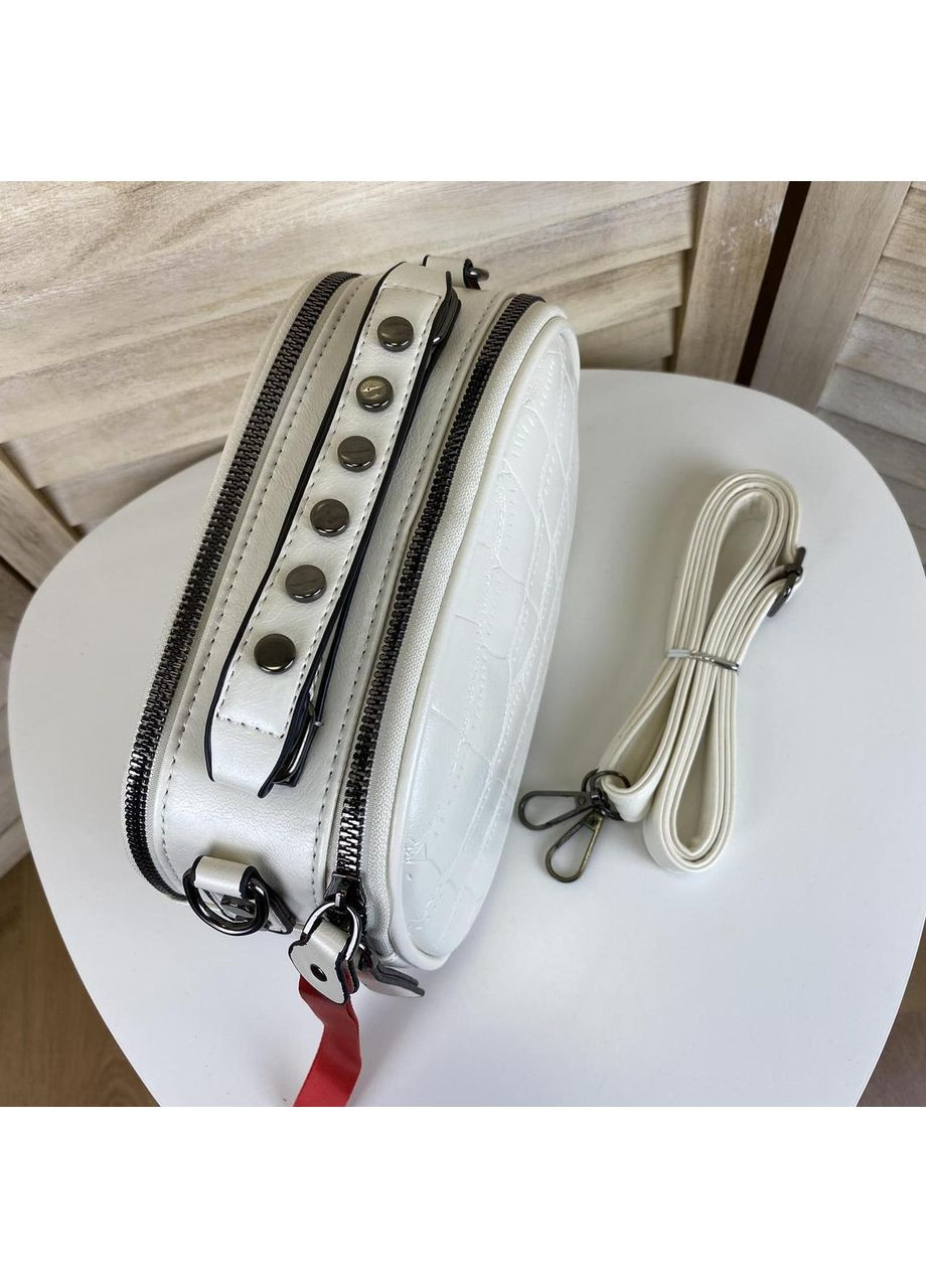 Сумка-клатч женская молочная из искусственной кожи с плечевым ремнем и змеиным принтом ProDobro (363259592)