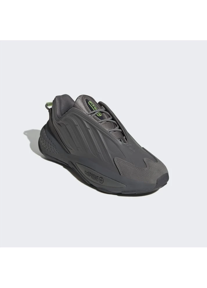 Зеленые всесезонные кроссовки originals ozrah green gx3239 adidas
