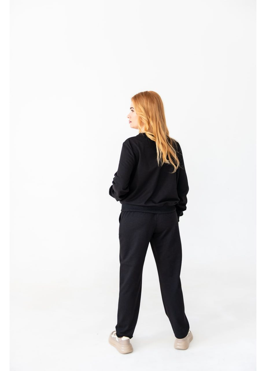 Черные свободные однотонные повседневные хлопковые спортивные штаны джоггеры из хлопка на манжетах с карманами женские оверсайз No Brand (362419425)