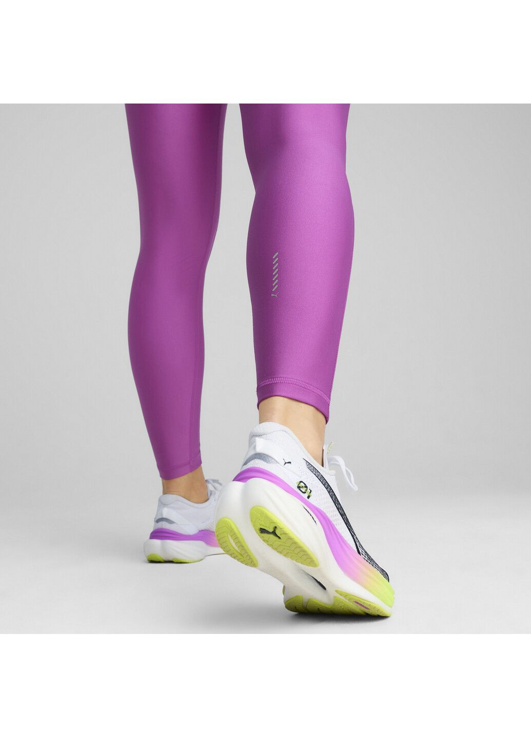 Пурпурные демисезонные леггинсы velocity running tights women Puma