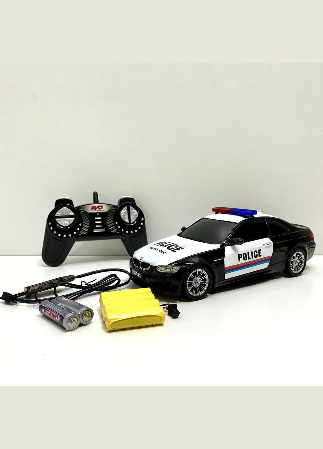 Машина на радіокеруванні Поліція пульт 2.4GHz підсвічування акум 4.8V гумові колеса USB кабель Чорна (866-1803 PB) GUOKAI (327877812)