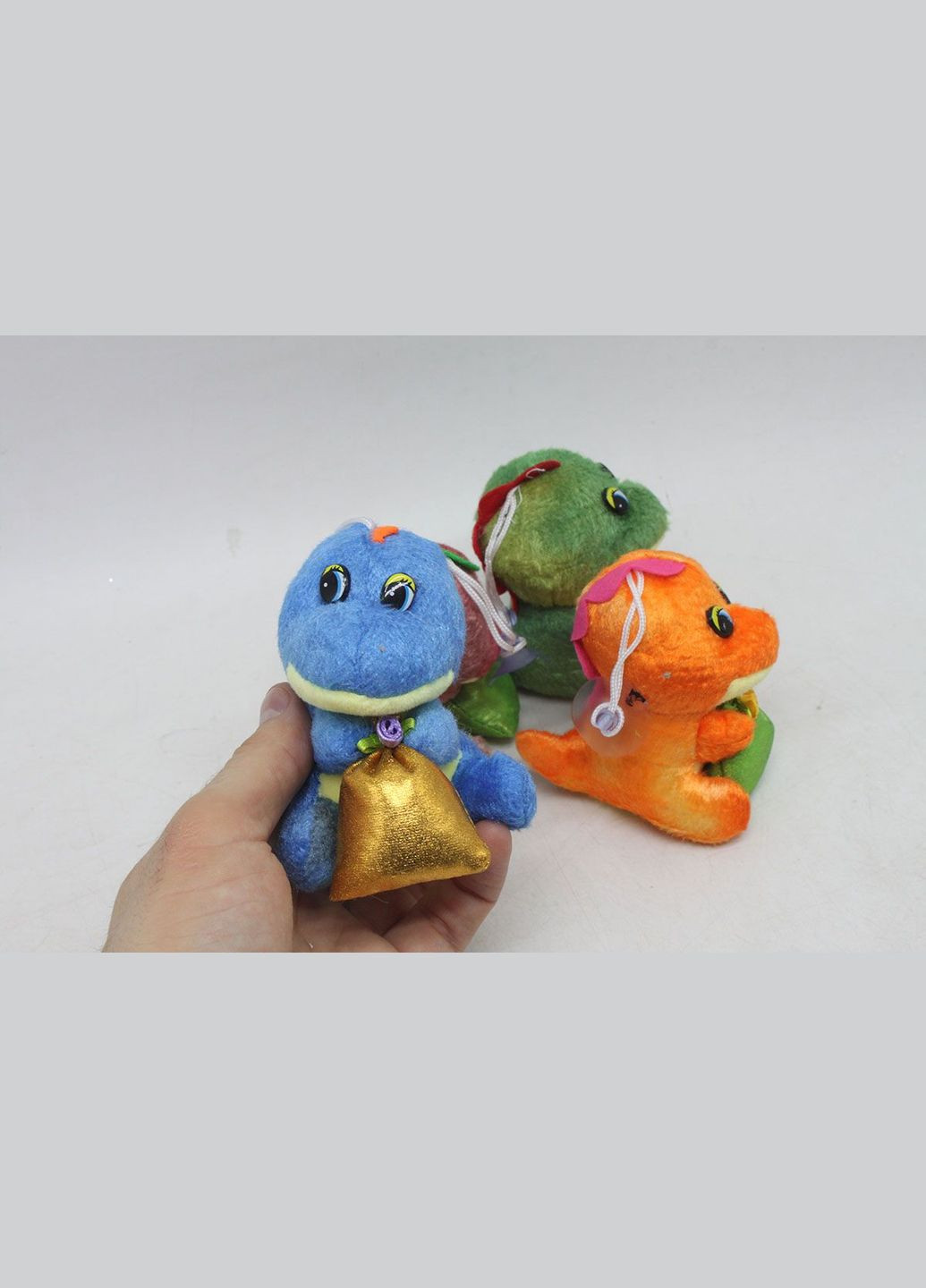 Мʼяка іграшка "Дракон з мішечком", коричневий (9 см) MIC (294726201)