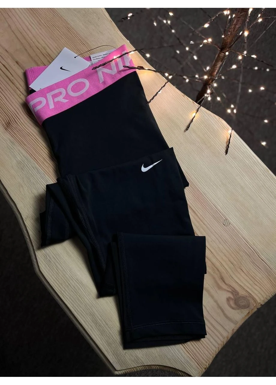 Лосини жіночі чорні NP 365 Tight Crop розмір M Nike (386499033)