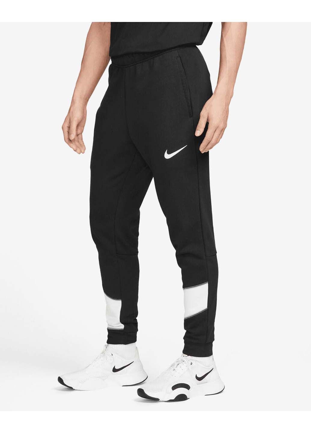Чоловічі брюки M Dri Fit Men Tapered Nike (293971821)