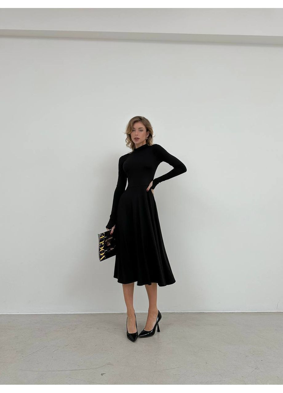 Чорна еластична сукня кльош міді чорного кольору 35951 кльош Fashion однотонна