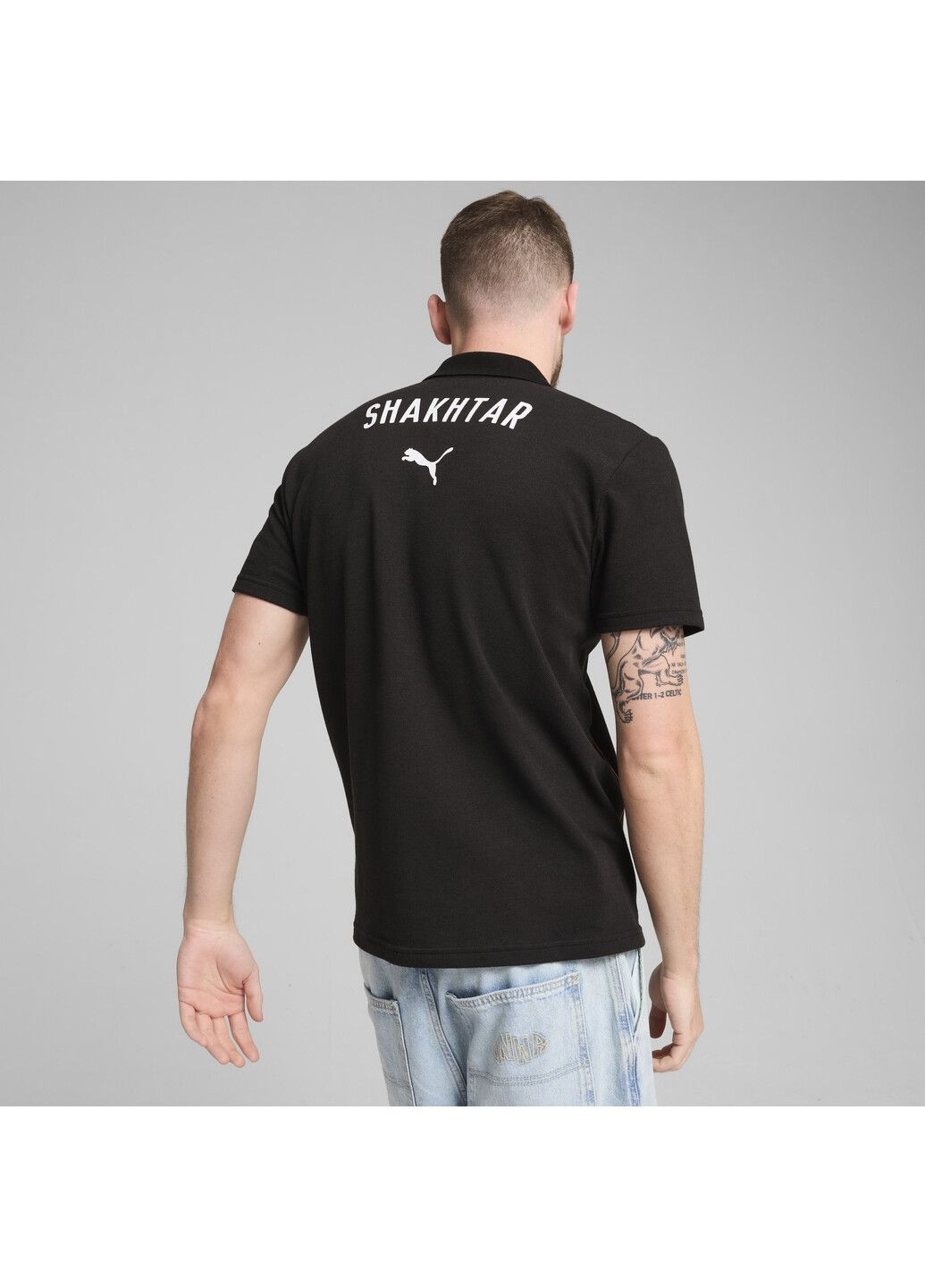 Черная футболка-поло fc shakhtar donetsk casuals polo men для мужчин Puma однотонная